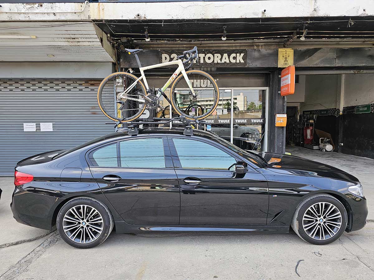 BMW 520 ติดตั้ง แร็คจักรยานบนหลังคา thule bikerack รุ่น Proride 598