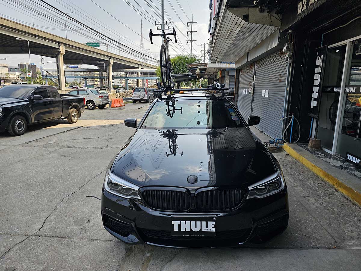 BMW 520 ติดตั้ง แร็ควางจักรยาน thule bikerack รุ่น Proride 598